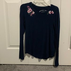 Long sleeve blue top, very soft and flexible material